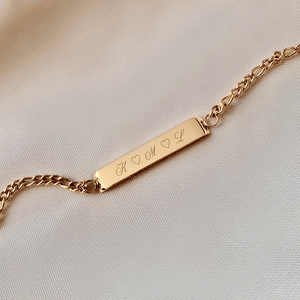 Personalized bar gold bracelet with space for engraving of text or coordinates