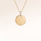 Round gold necklace with white zirconia without engraving – ready for your personal text, coordinates or handwriting on the front and back