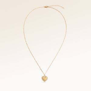 Full heart-shaped necklace in gold fully laid out with fine adjustable gold chain and minimalist heart pendant for personalized engraving