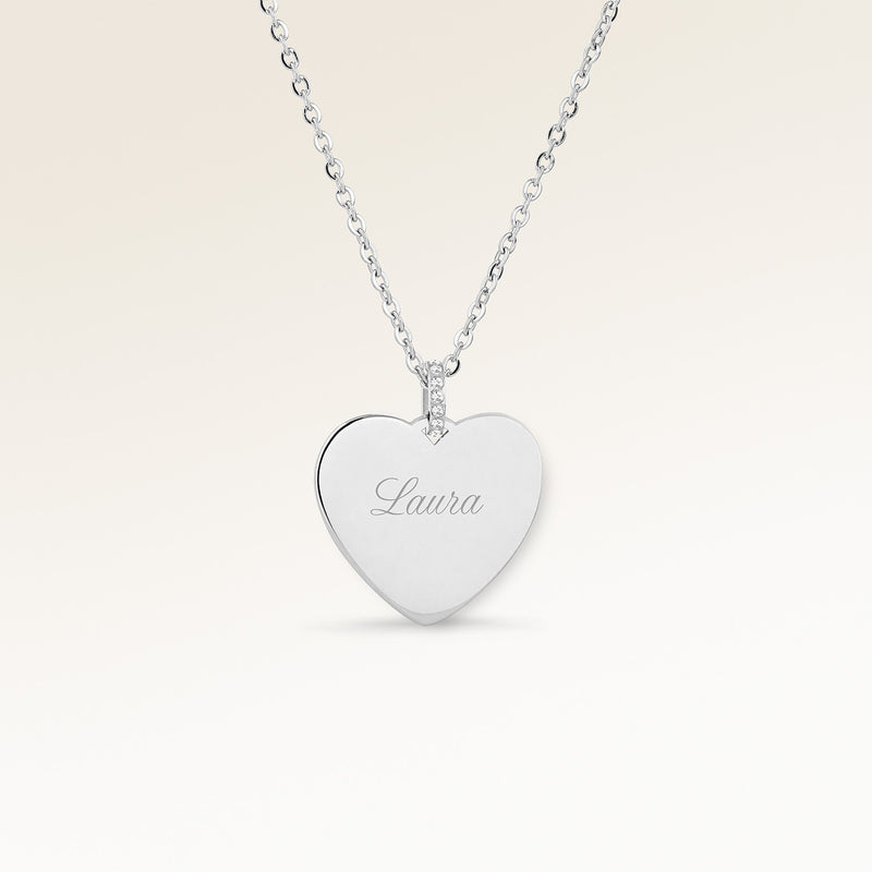 Personalized heart-shaped silver necklace with white zircons and space for engraving of text, coordinates or handwriting on the front and back