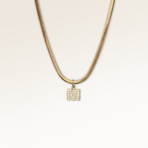 Letter pendant M in gold with white zircons, personalized initial necklace from Mon Chou