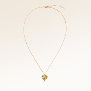 Full heart-shaped necklace in gold fully laid out with fine adjustable gold chain and minimalist heart pendant for personalized engraving
