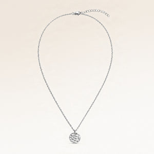 Full round silver necklace laid out flat with a fine adjustable silver chain and a minimalist round pendant for personal engraving